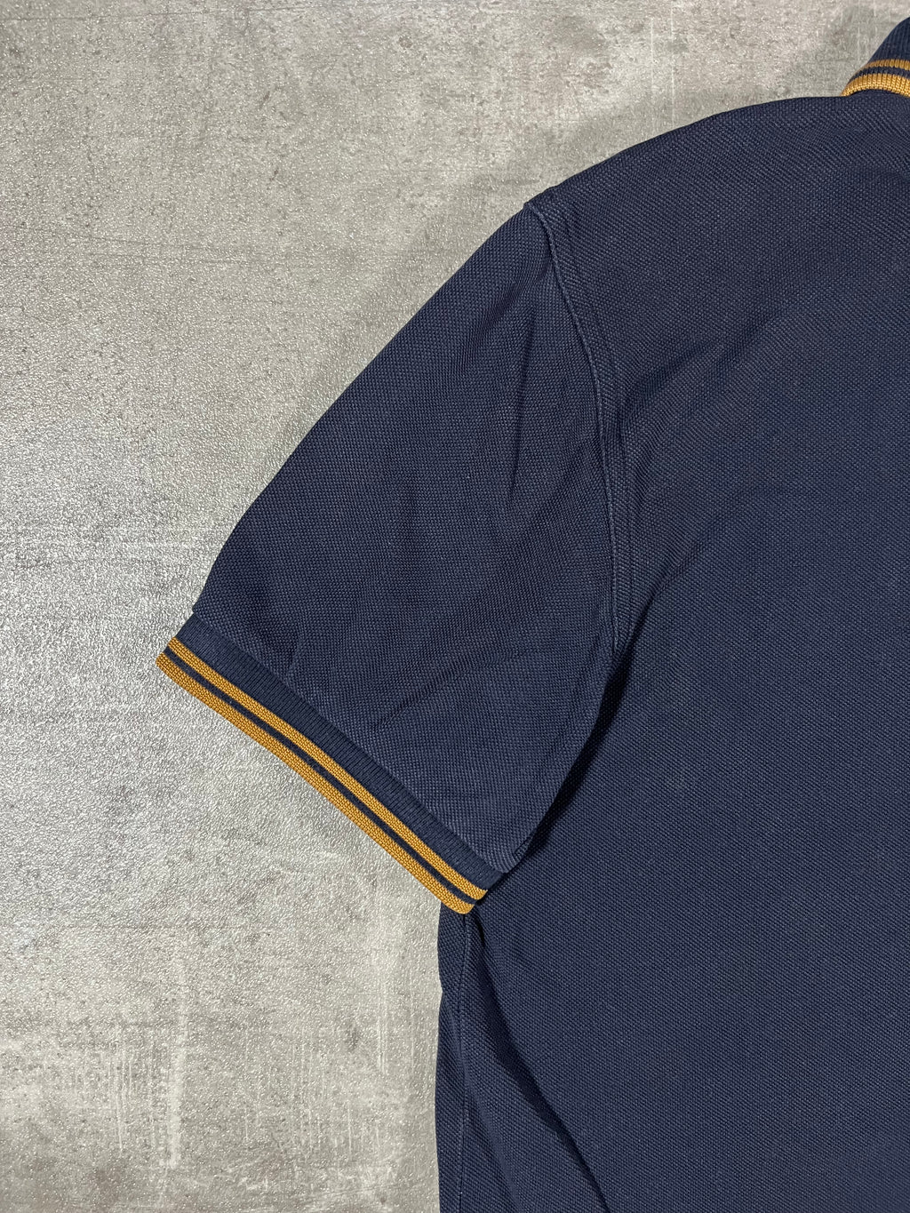 Fred Perry Poloshirt Schwarz/ Gold M