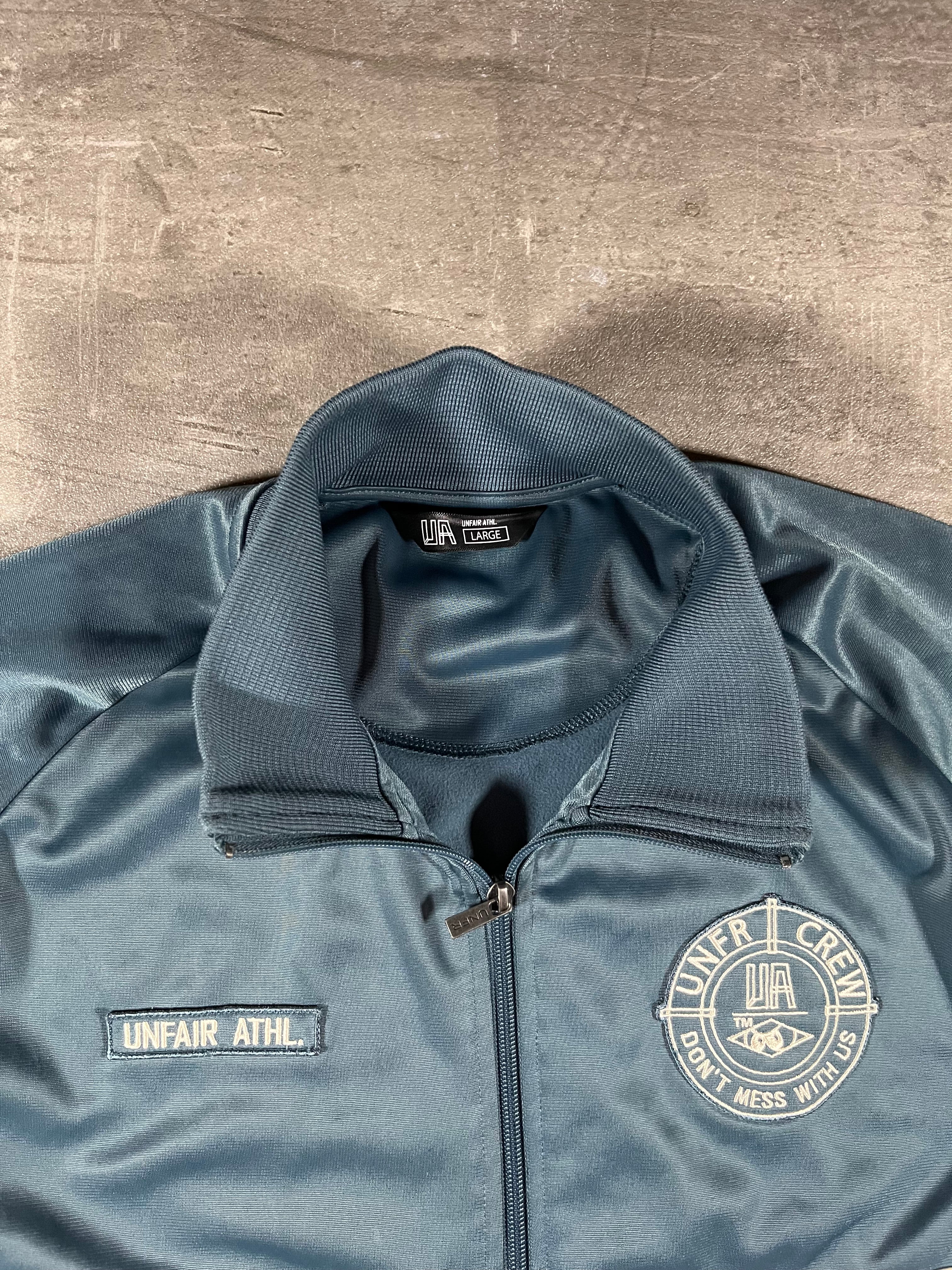 Unfair Athletics Trainingsjacke Hellblau L