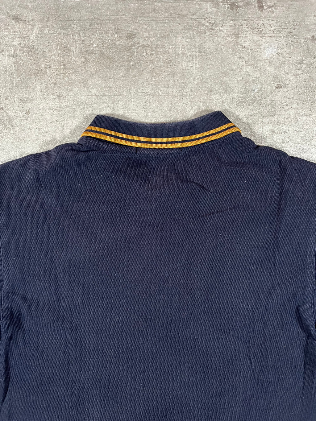 Fred Perry Poloshirt Schwarz Goldenes Logo S
