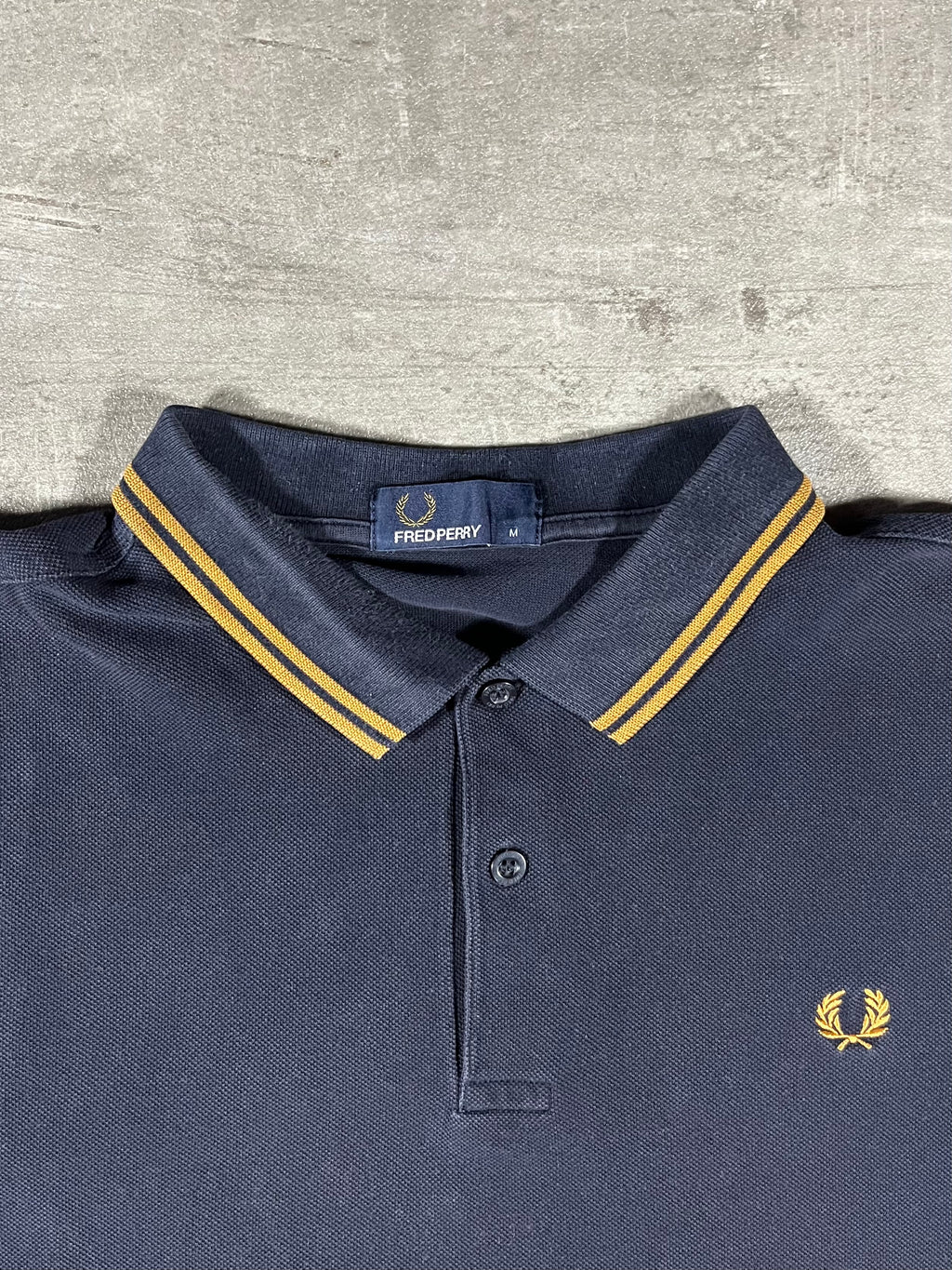 Fred Perry Poloshirt Schwarz/ Gold M