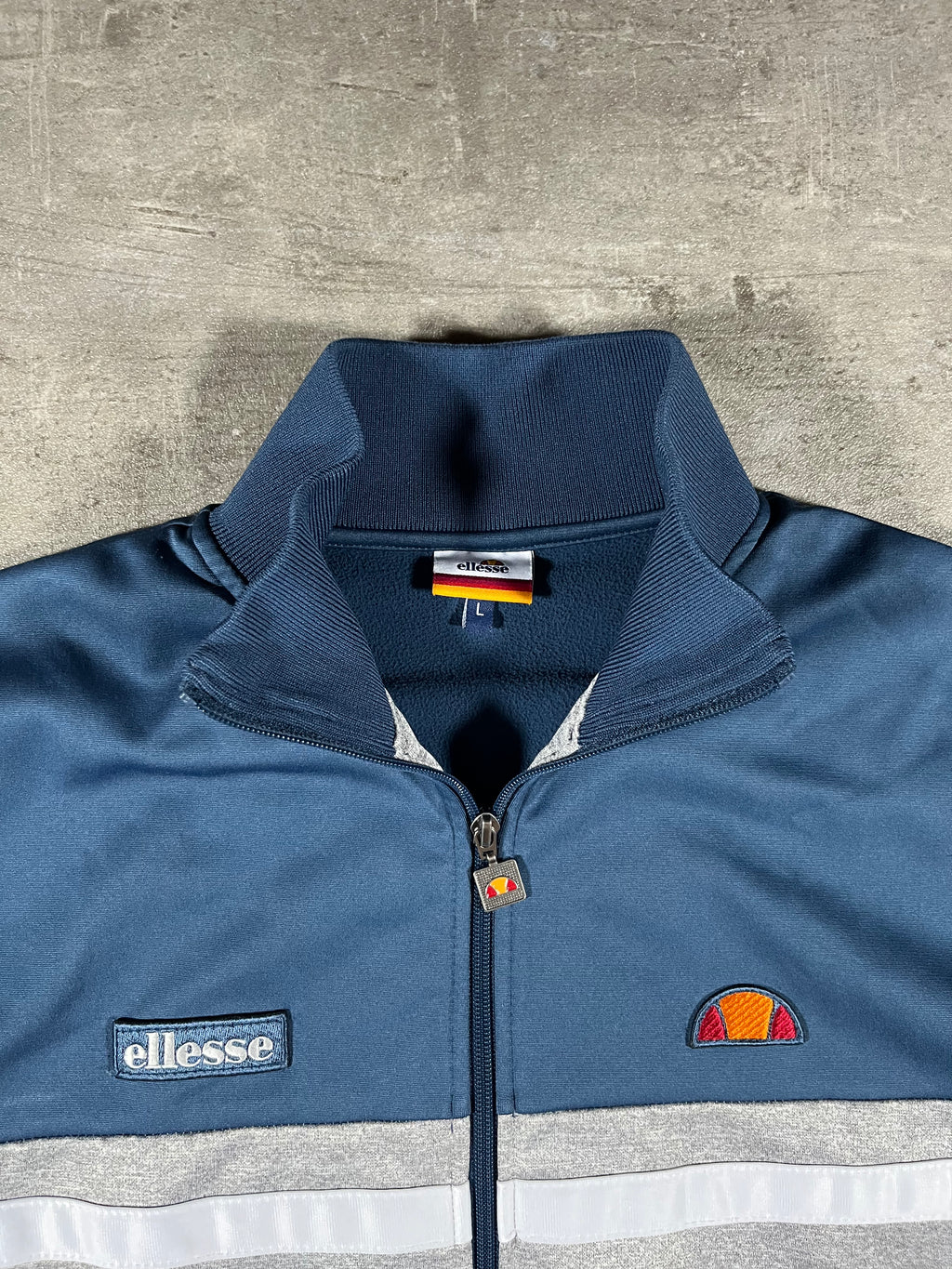 ellesse Trainingsjacke Grau/ Hellblau L