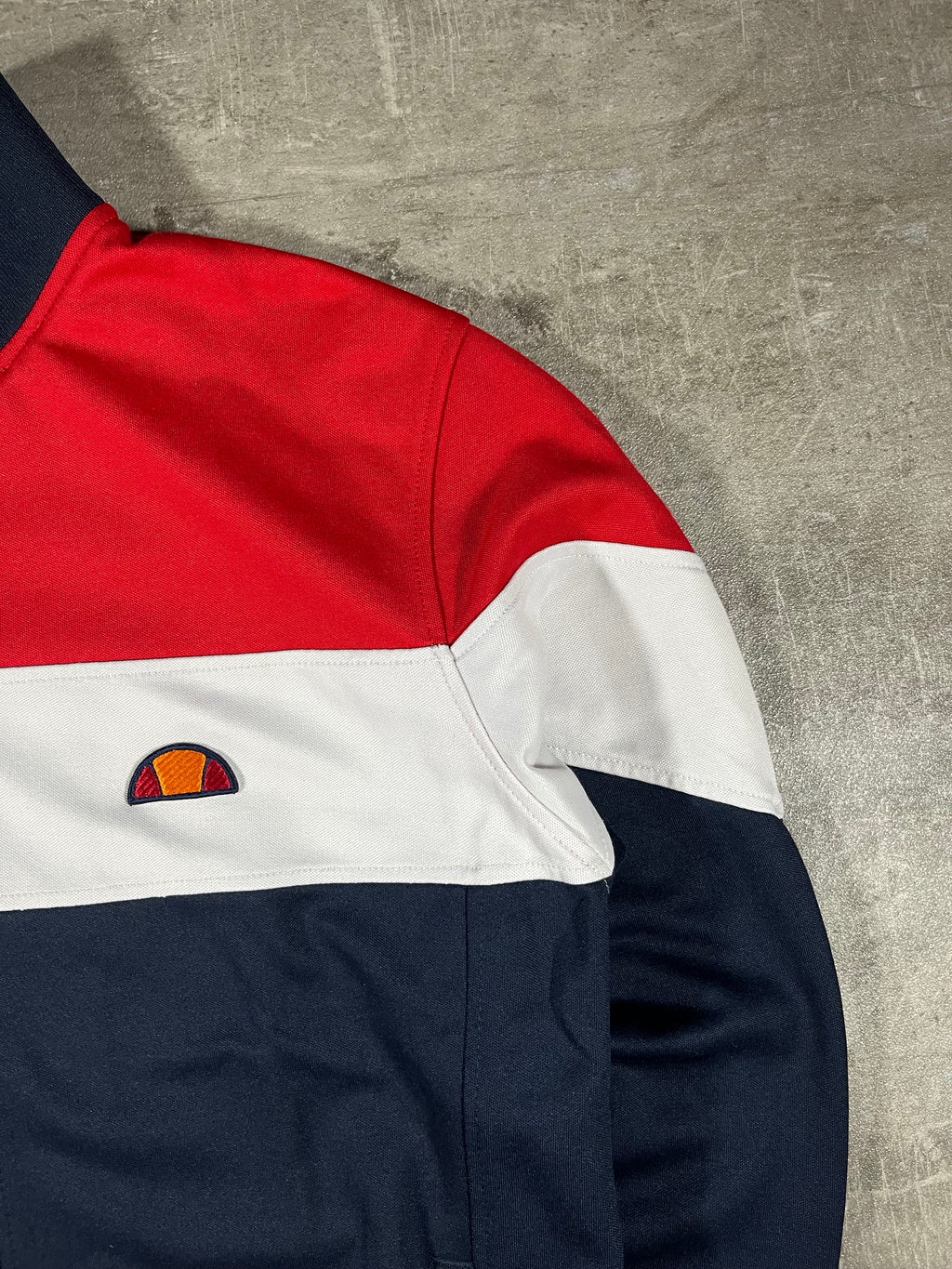 ellesse Trainingsjacke Caprini Blau/ Weiß/ Rot M
