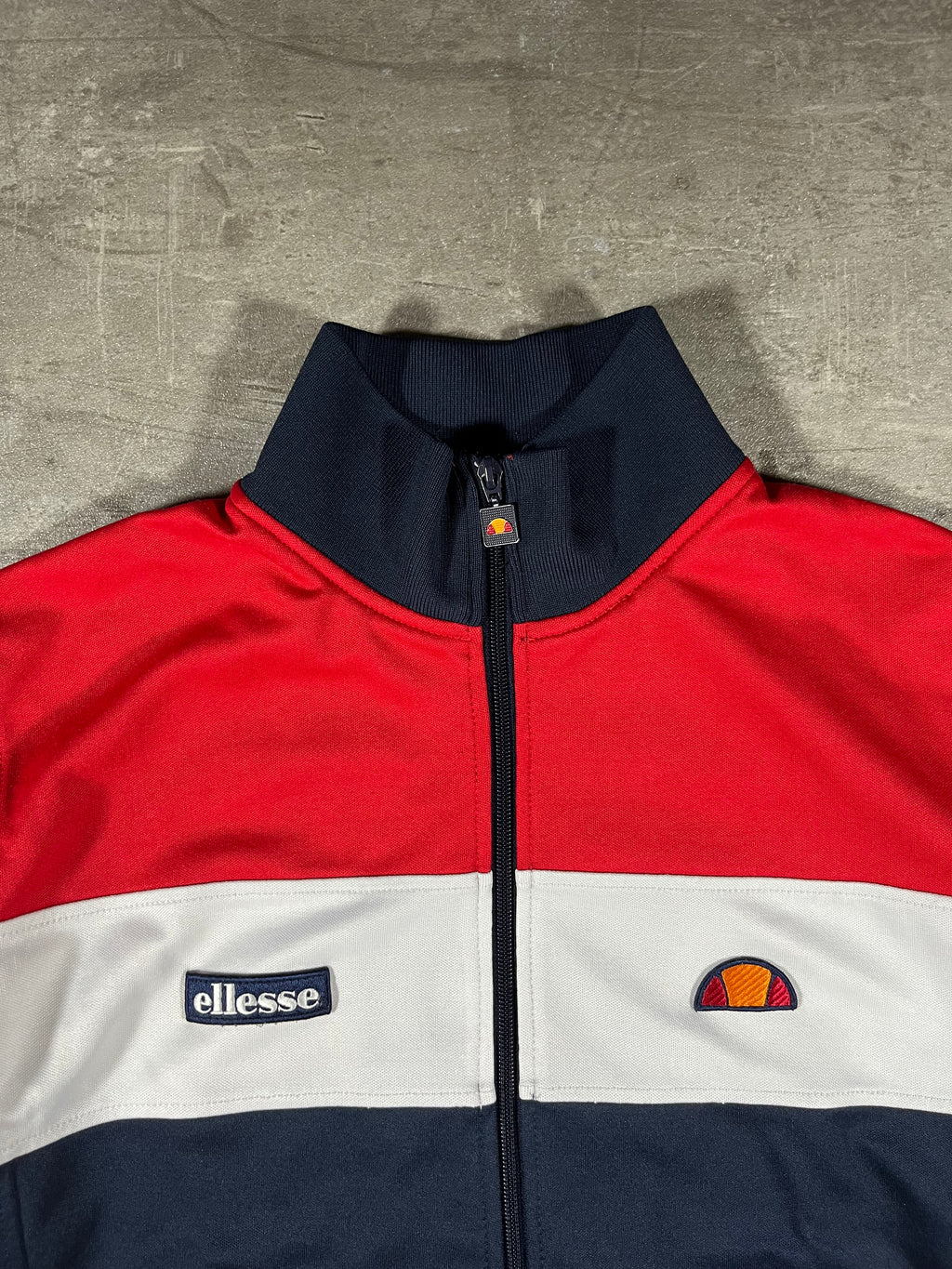 ellesse Trainingsjacke Caprini Blau/ Weiß/ Rot M