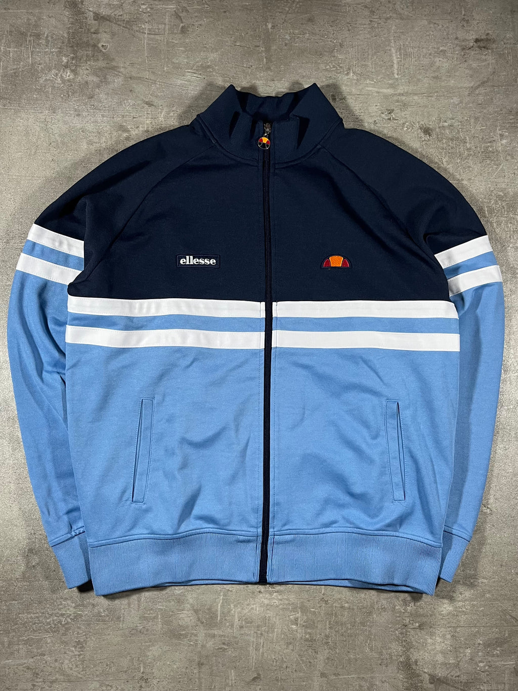 ellesse Rimini Trainingsjacke Schwarz/ Hellblau XL