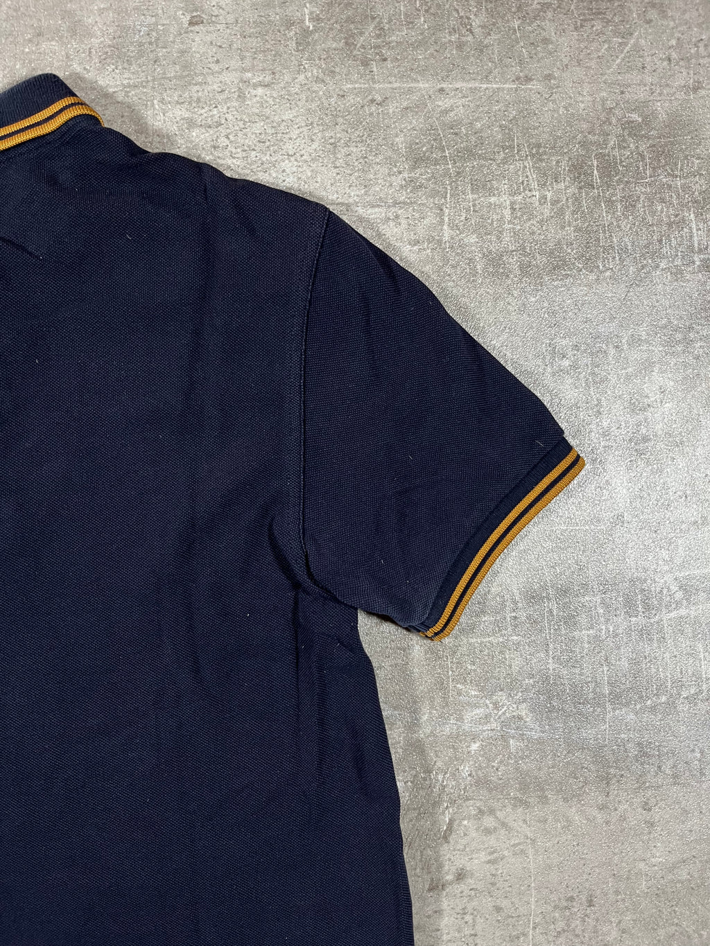 Fred Perry Poloshirt Schwarz Goldenes Logo S