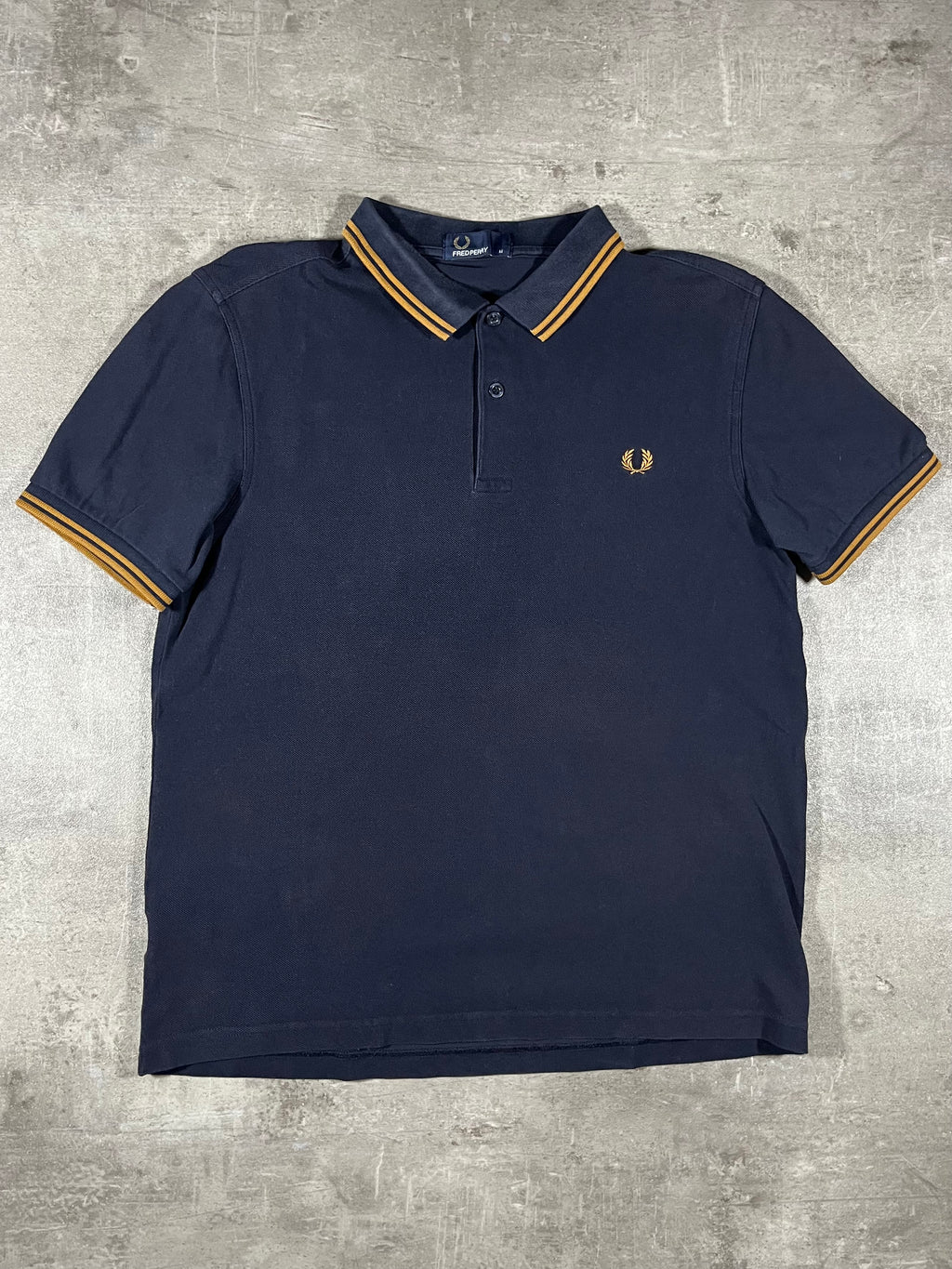 Fred Perry Poloshirt Schwarz/ Gold M